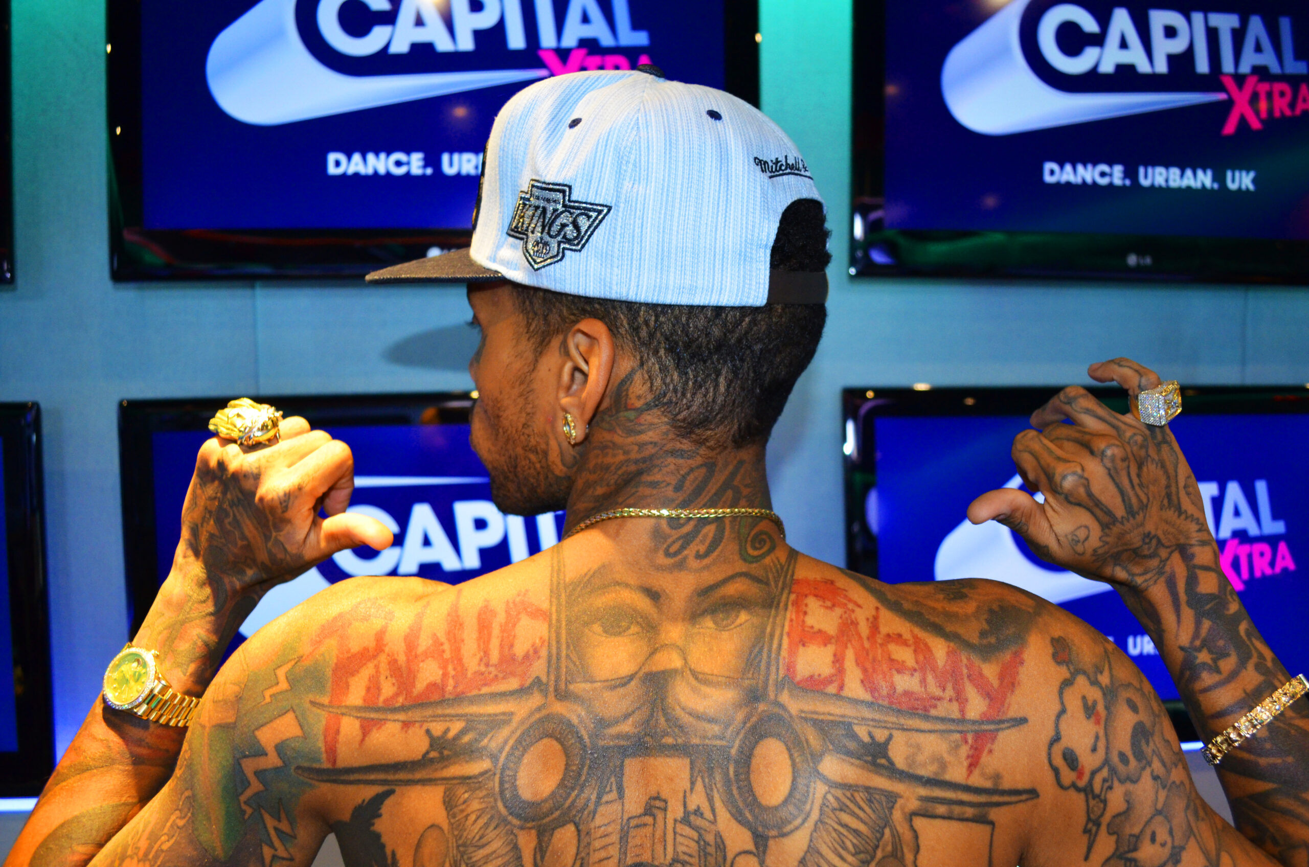 Kid Ink back tattoos