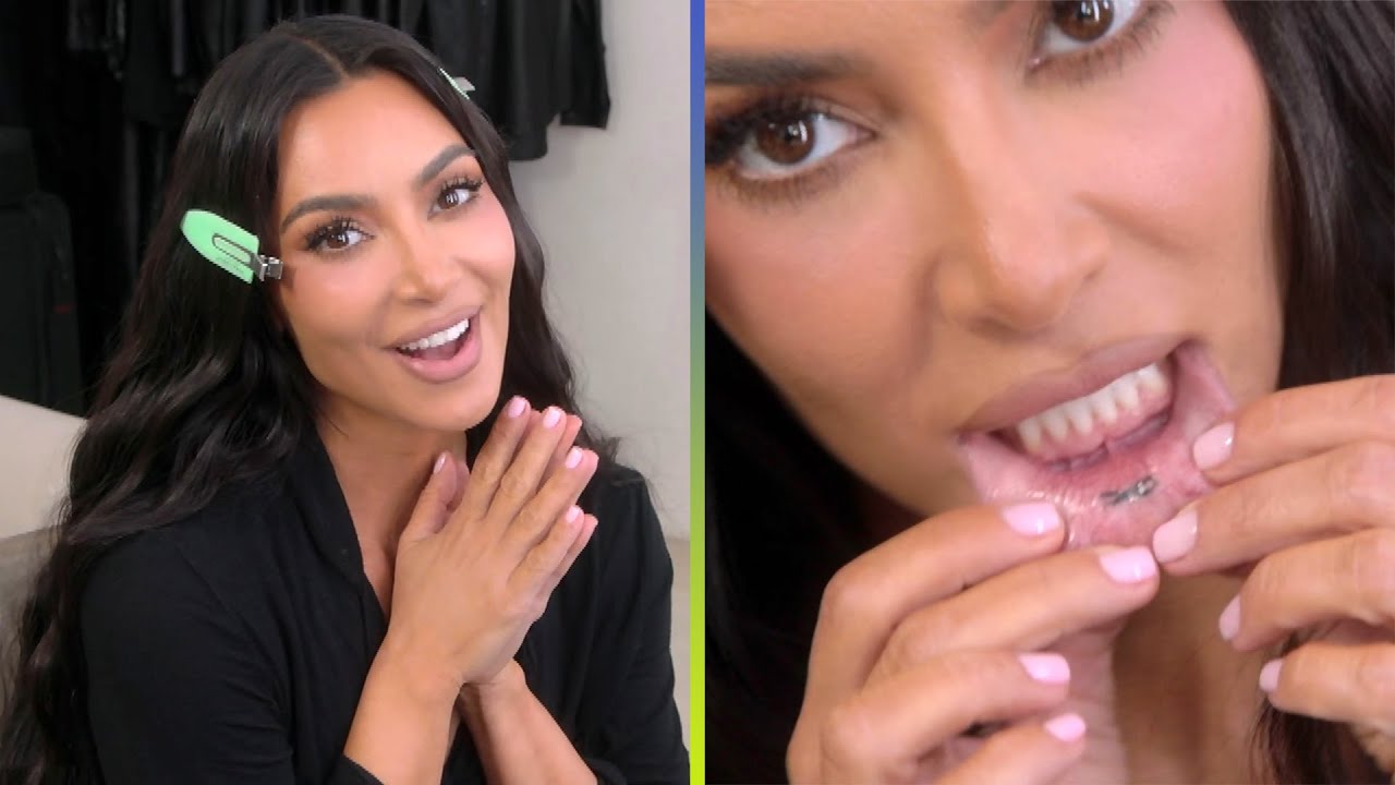 Kim Kardashian tattoos: inner-lip infinity tattoo