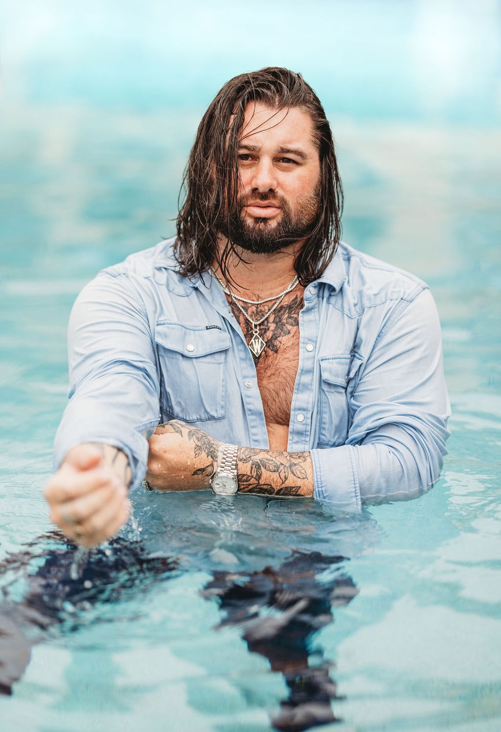 Koe Wetzel forearm and chest tattoos