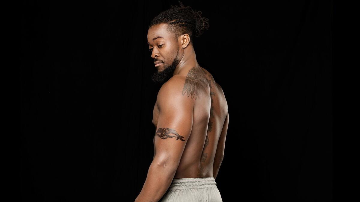 Kofi Kingston tattoos: inline winged back tattoo image