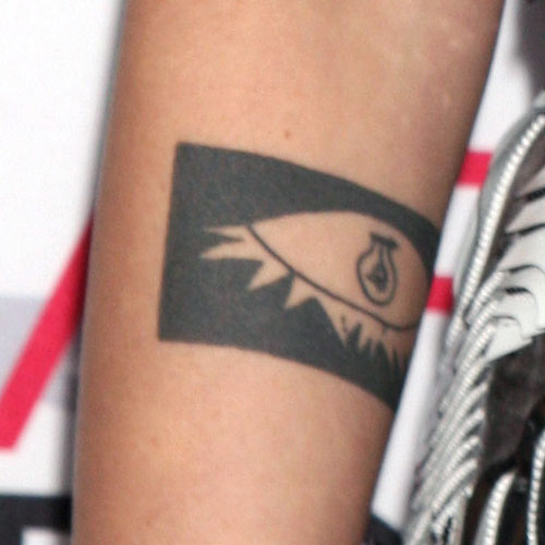 Kristen Stewart Picasso-inspired eye arm tattoo