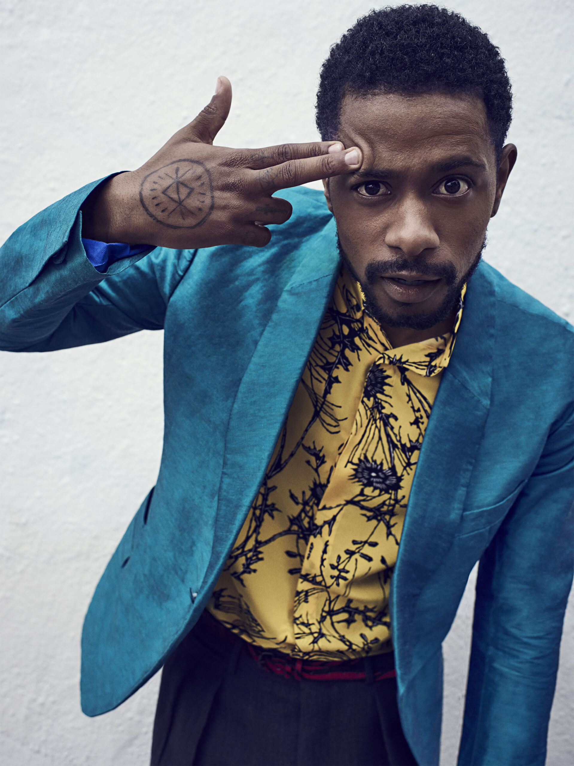LaKeith Stanfield tattoos: LaKeith Stanfield circular hand/wrist tattoo reference
