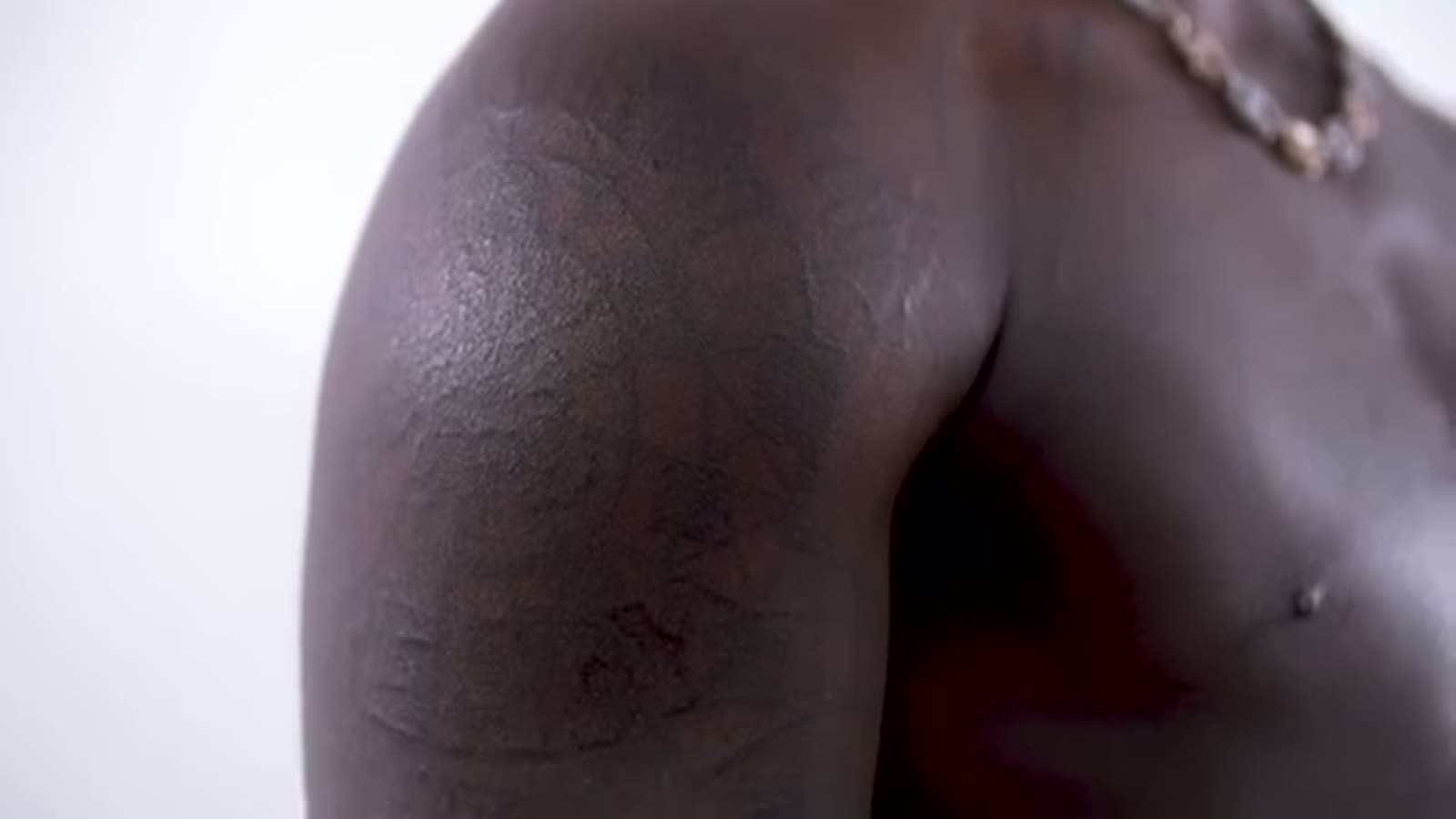 Lance Stephenson family tattoo context Lance Stephenson tattoos: GQ Tattoo Tour shoulder close-up showing Stephenson’s tattoo field during the family tattoo discussion