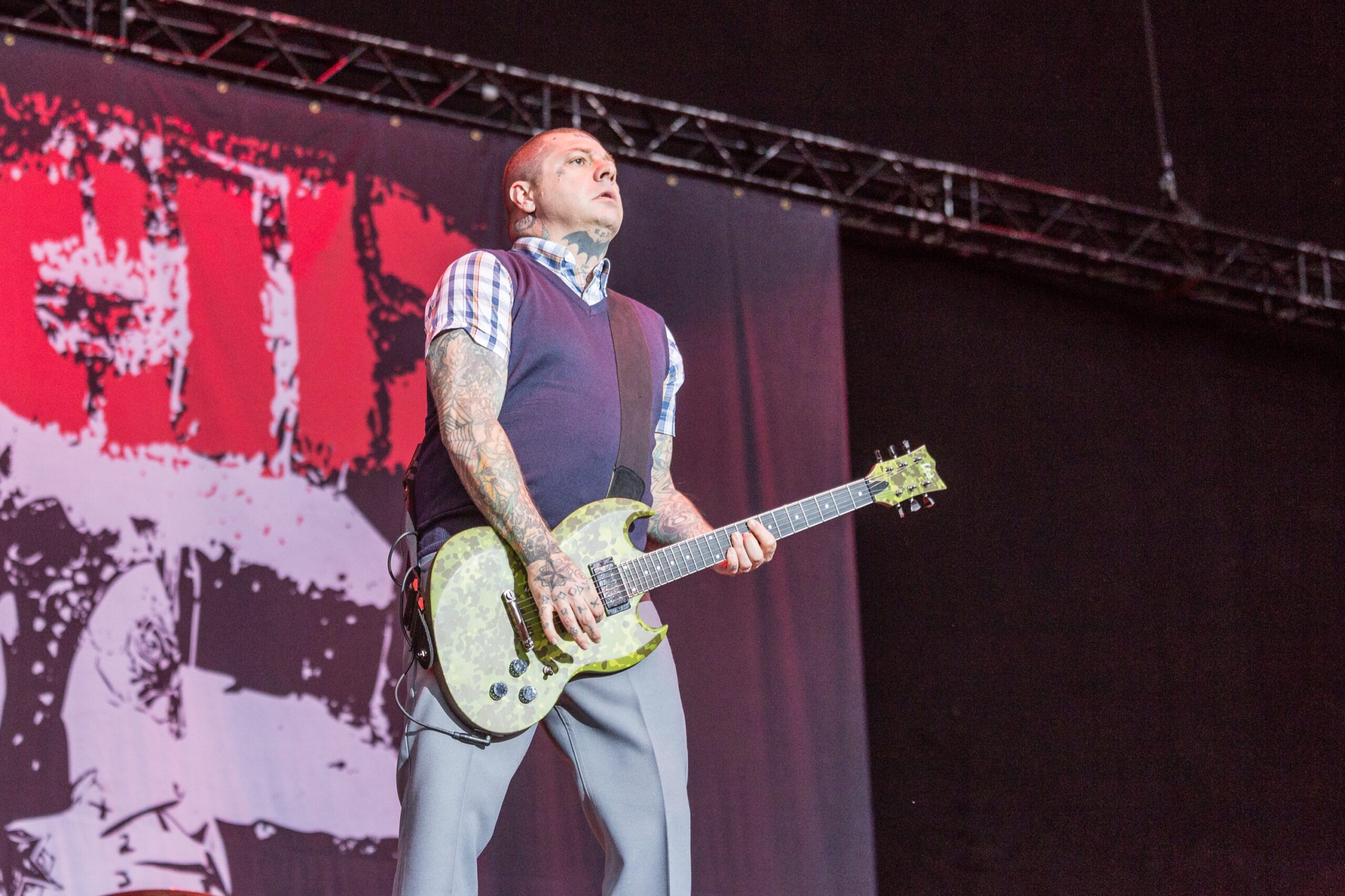 Lars Frederiksen neck and arm tattoos