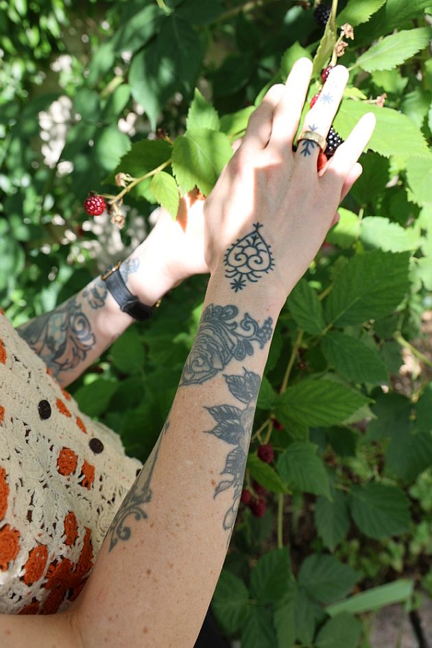 Laura Fella tattoos: Laura Fella's hand and wrist tattoo details