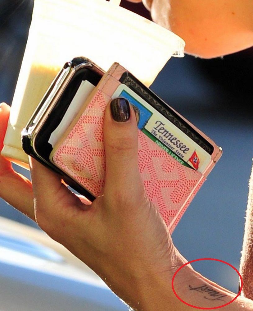 LeAnn Rimes Trust wrist tattoo with arrow