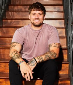 Levi Hummon Tattoos: Bull Skull, Roses and Arm Ink
