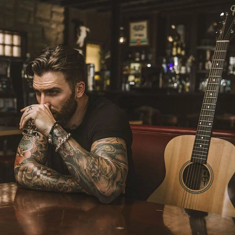 Levi Stocke tattoos: The roaring tiger on his upper-arm sleeve