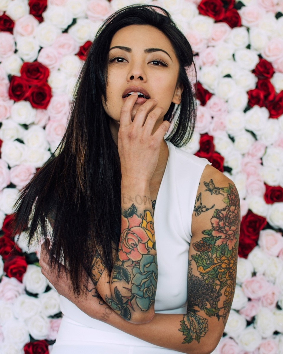 Levy Tran tattoos: Floral arm sleeve and shoulder tattoo details