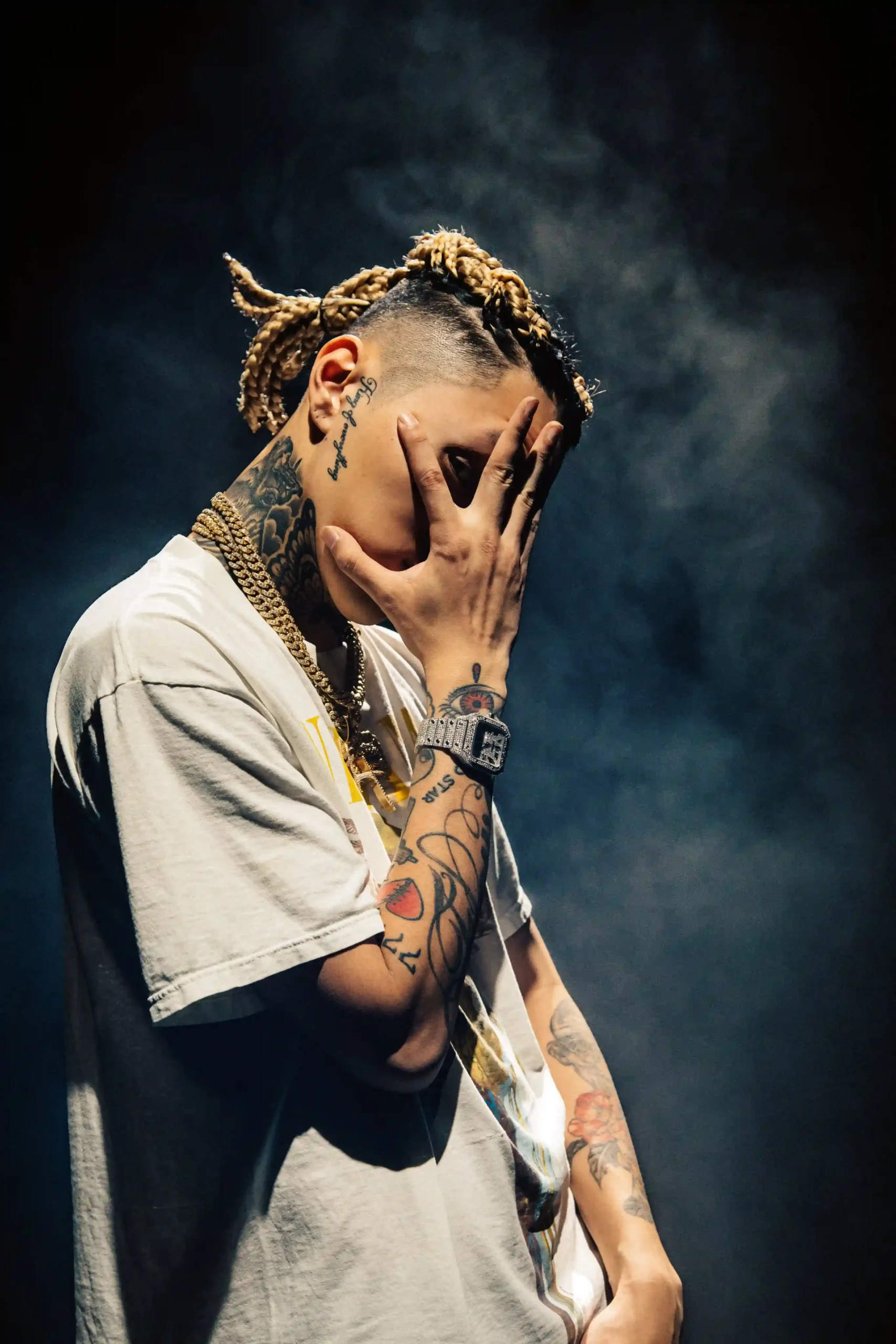 LEX A distinct high-resolution stage photograph showing LEX's neck and arm tattoos in performance LEX tattoos: A distinct high-resolution stage photograph showing LEX's neck and arm tattoos in performance