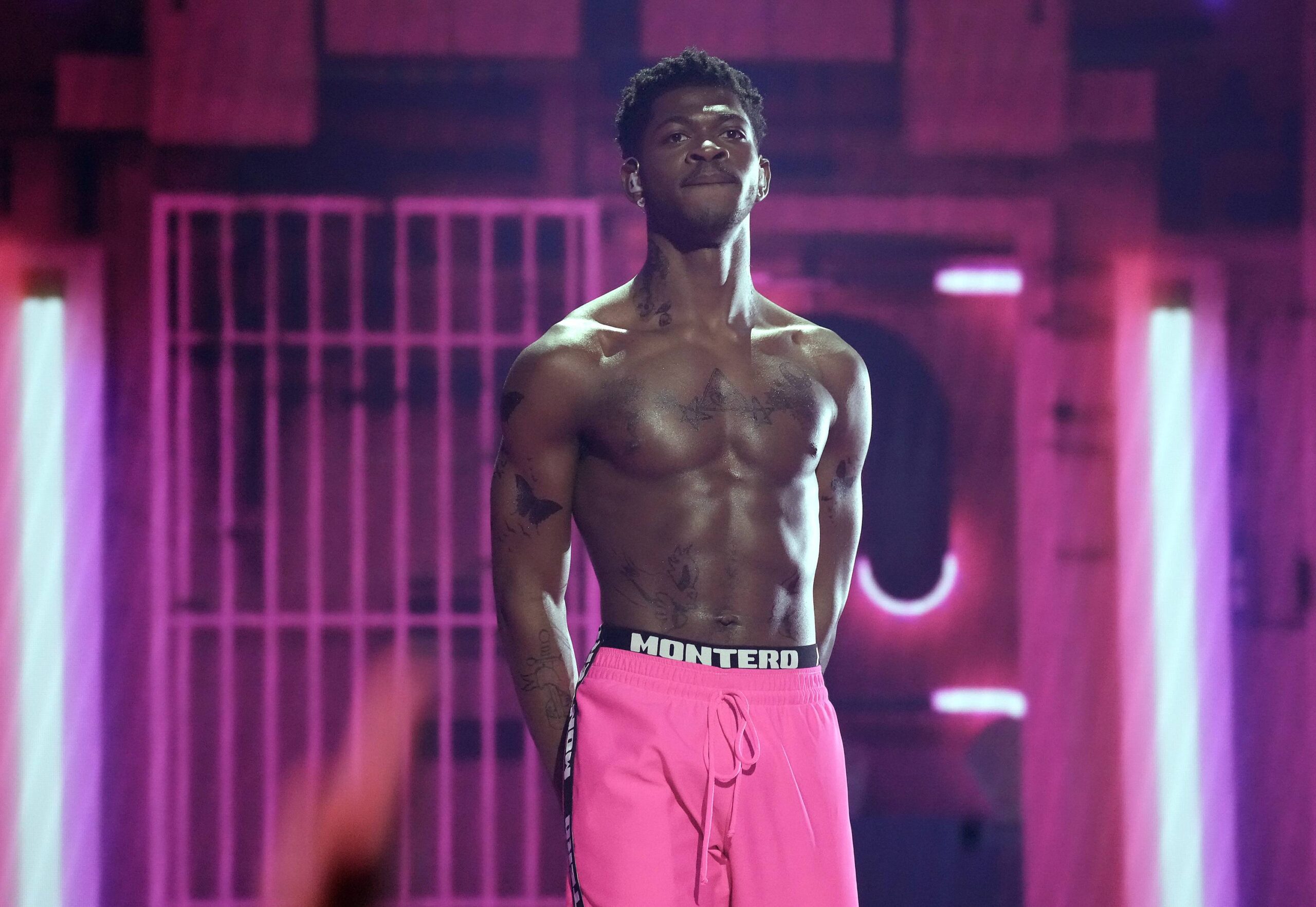 Lil Nas X tattoos: permanent ink versus stage body art