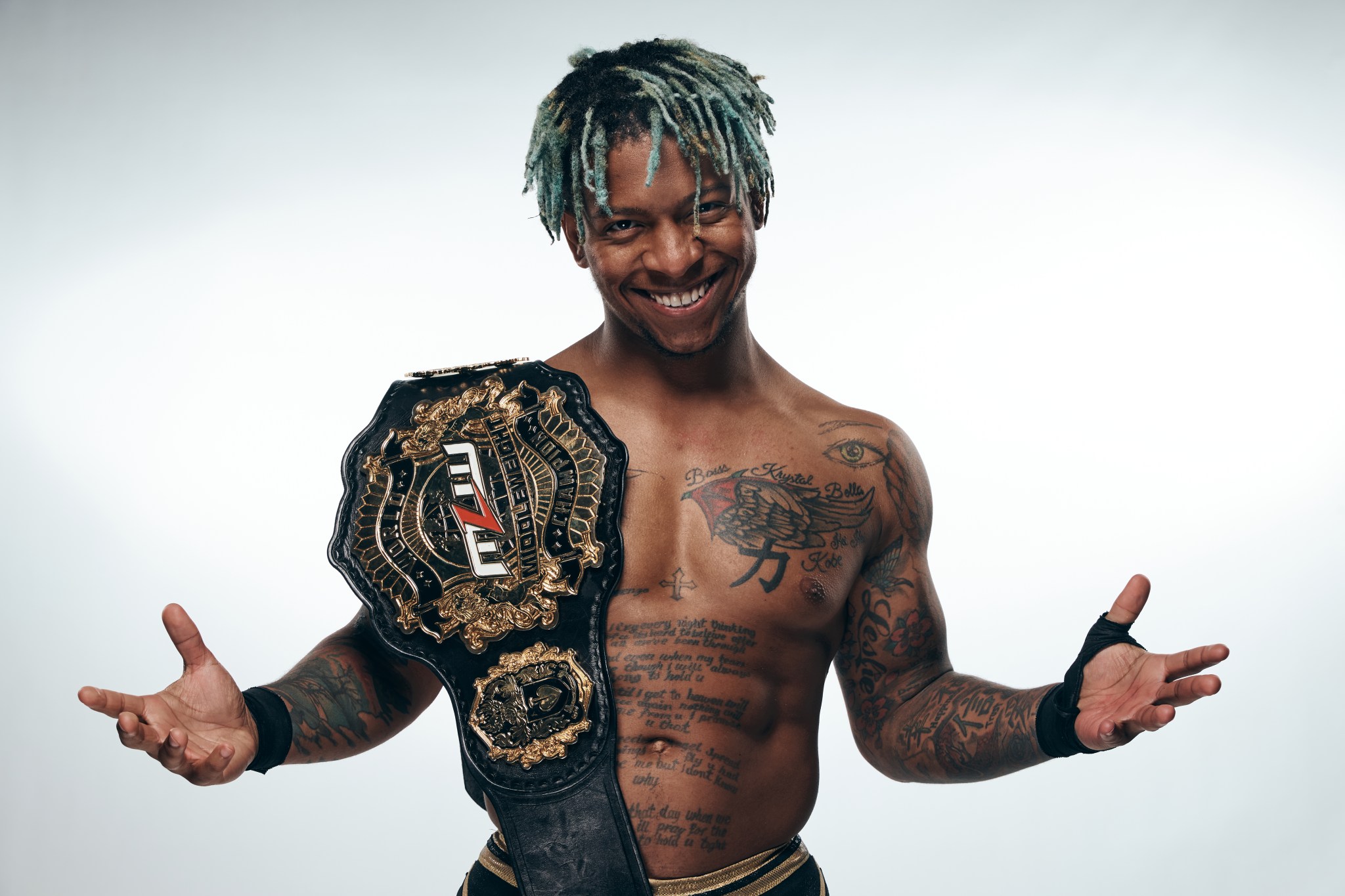 Lio Rush bird and names chest tattoo Lio Rush bird and names chest tattoo