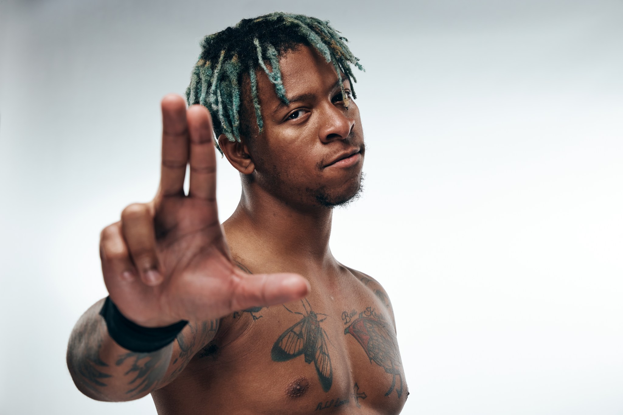 Lio Rush moth chest tattoo Lio Rush moth chest tattoo