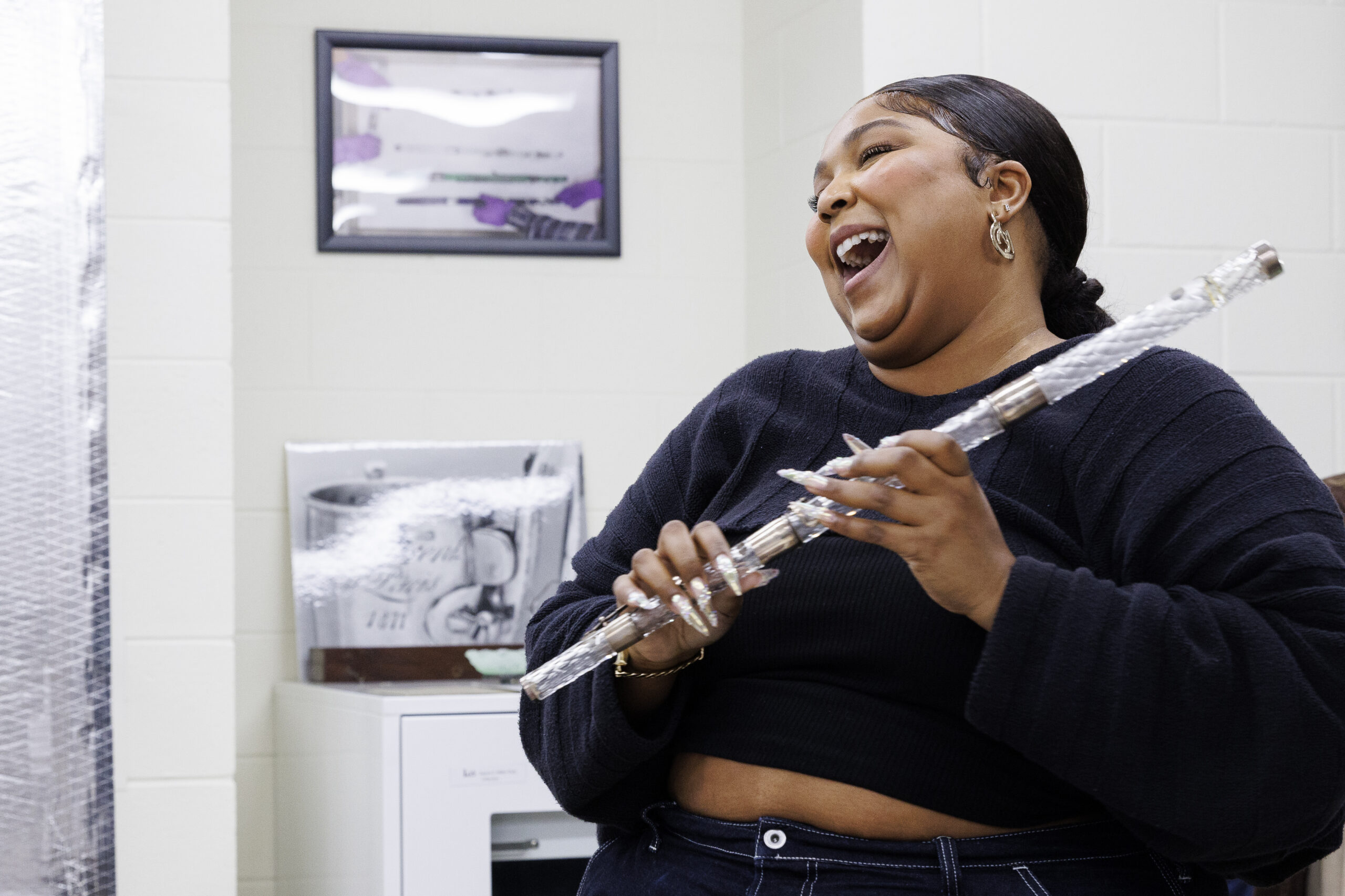 Lizzo in a contextual photograph: inline; not tattoo evidence