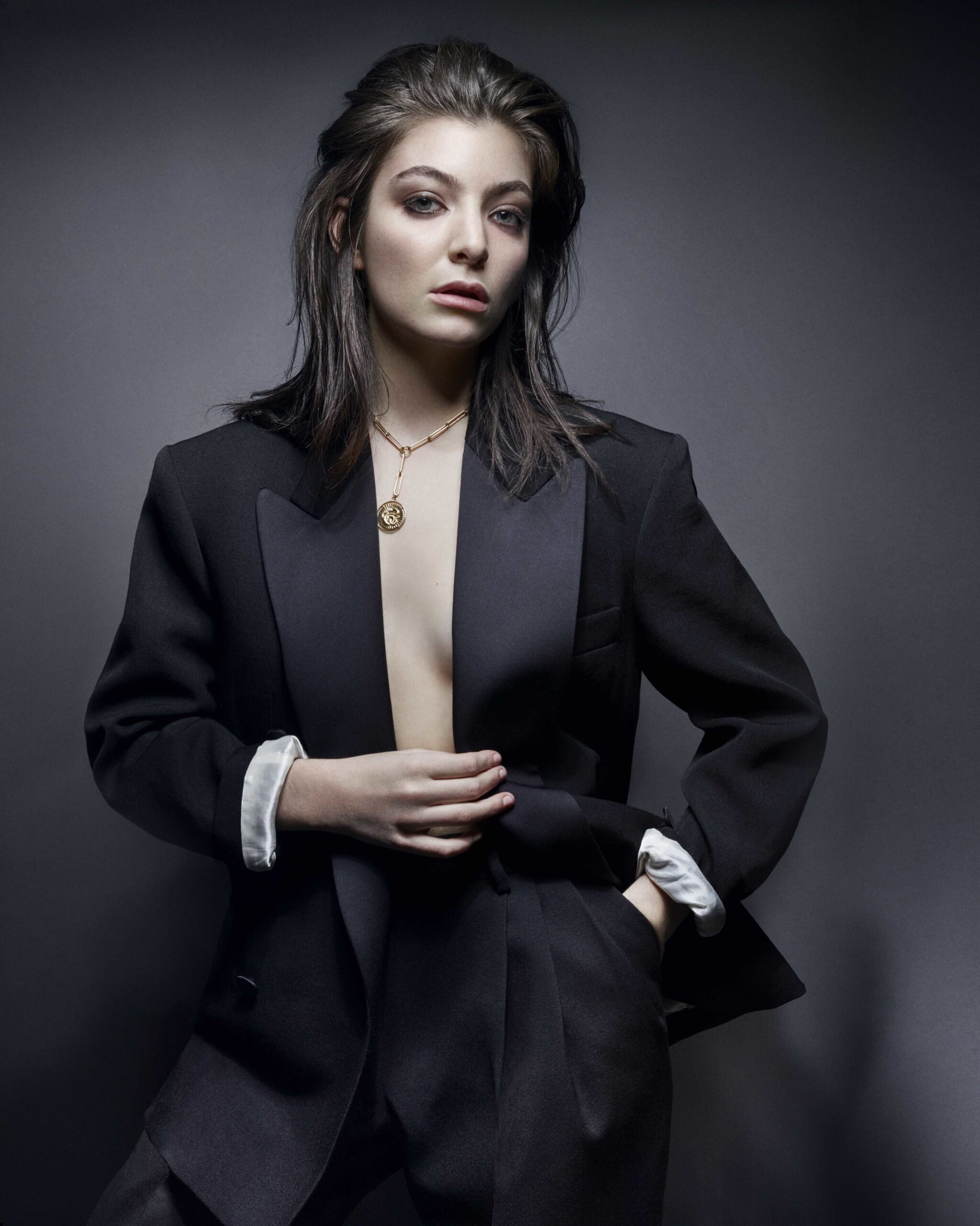 Lorde ELLE portrait Lorde in a contextual photograph: Inline contextual photo; not tattoo evidence; not tattoo evidence