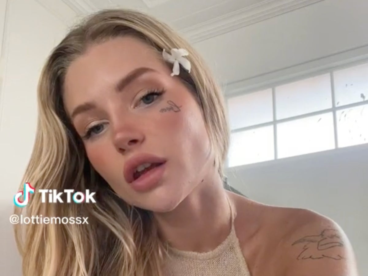 Lottie Moss tattoos: Close-up evidence for the Lover face tattoo section