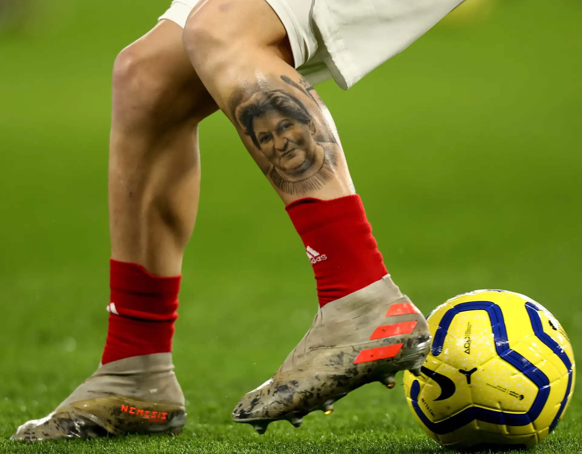 Lucas Torreira leg portrait tattoo Lucas Torreira tattoos: Genuine match photograph showing the realistic portrait tattoo on Torreira’s leg.