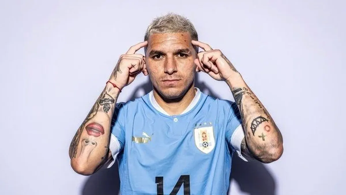 Lucas Torreira Uruguay tattooed arms Lucas Torreira tattoos: Genuine tattoo photograph showing Torreira’s forearm designs in a Uruguay media portrait.