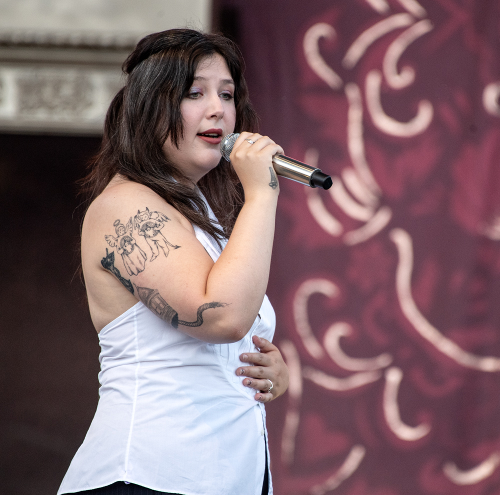 Lucy Dacus animal and architectural arm tattoos Lucy Dacus tattoos: inline