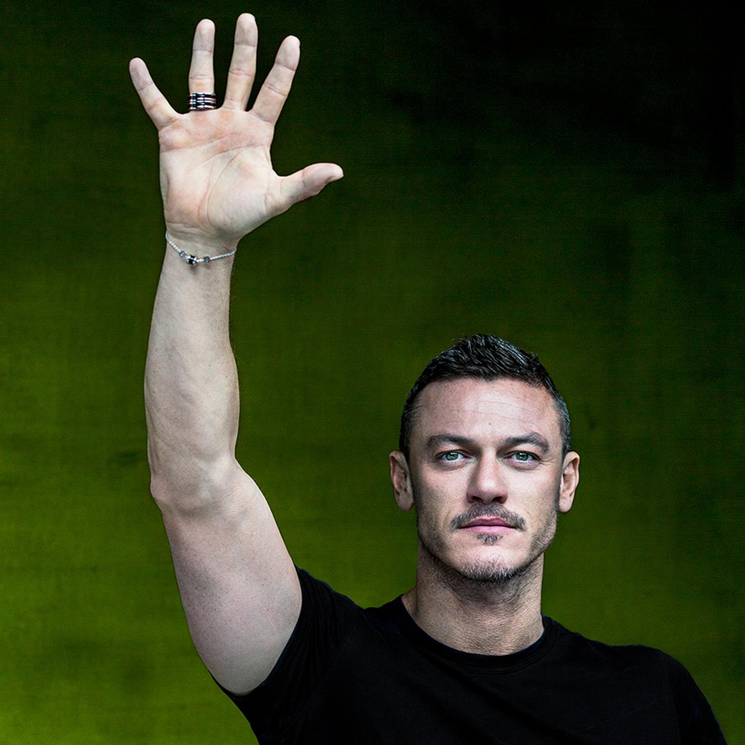 Luke Evans in a contextual photograph: Contextual portrait; explicitly not tattoo evidence; not tattoo evidence