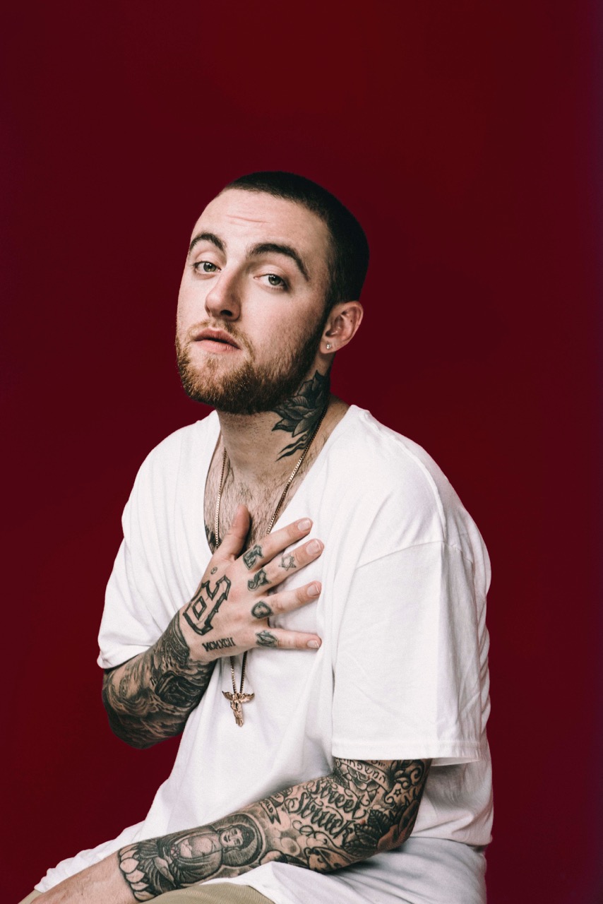 Mac Miller tattoos: forearm lettering and portrait ink