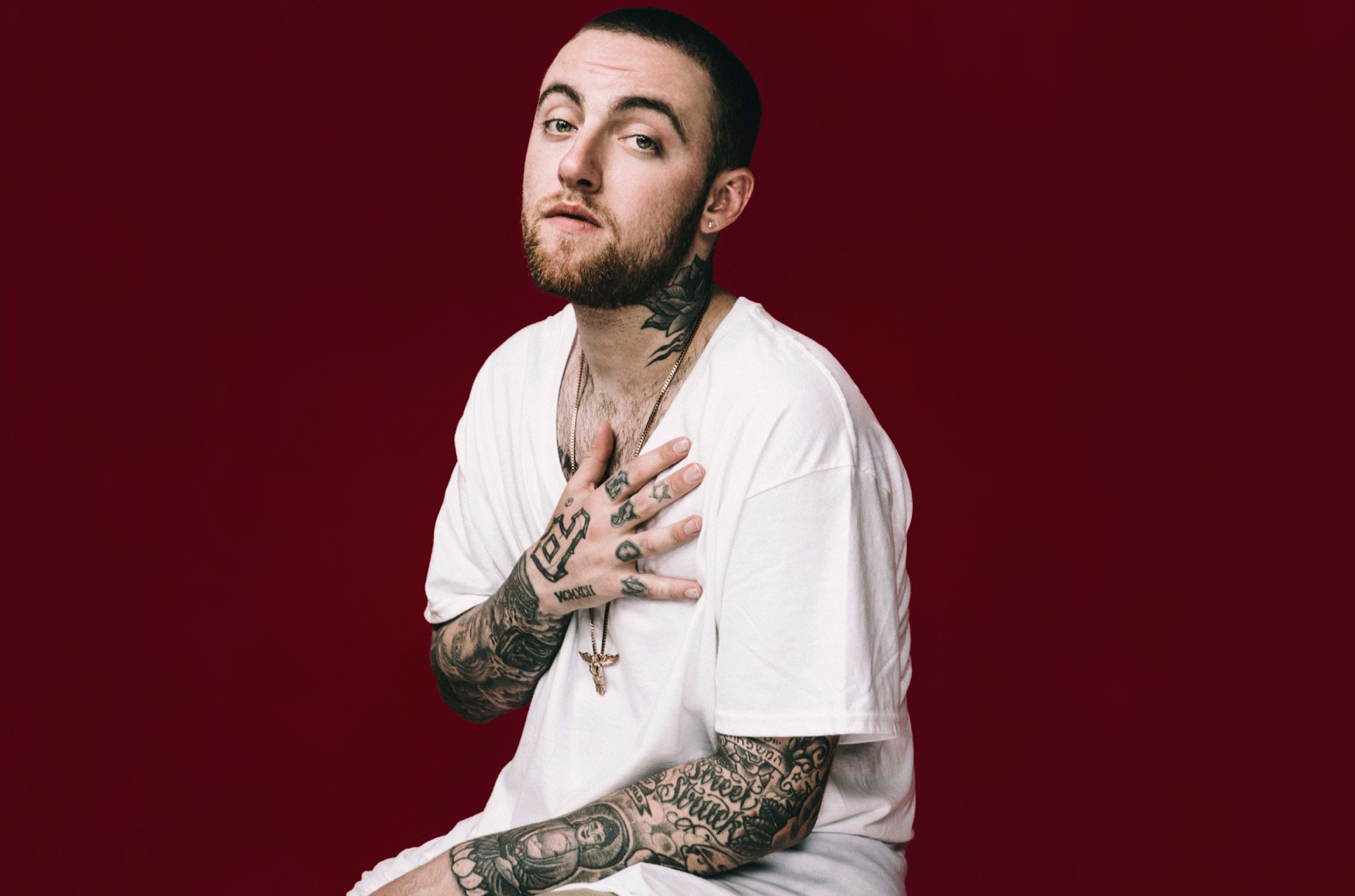 Mac Miller tattoos: neck and hand tattoos