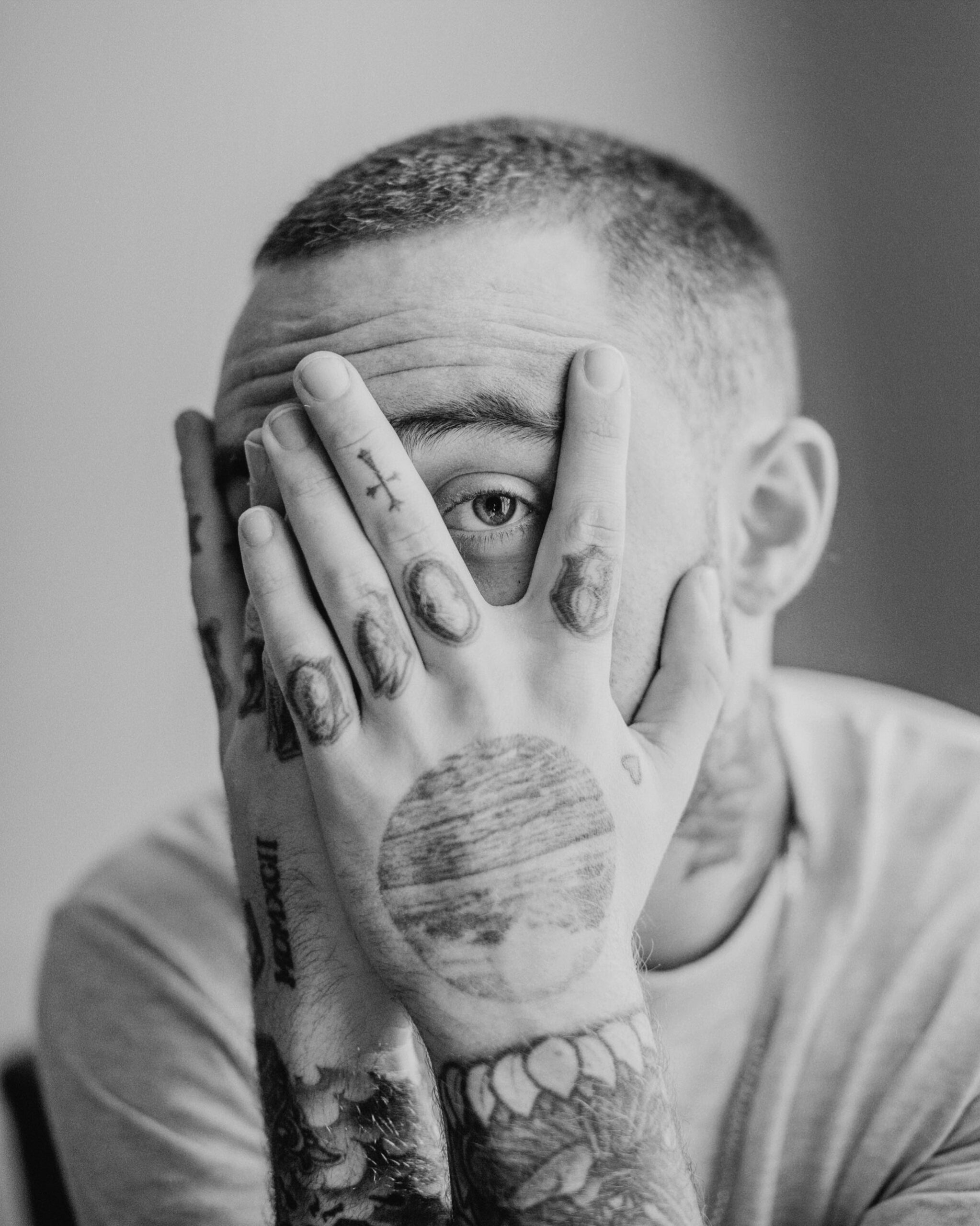 Mac Miller tattoos: tattooed hands and finger ink