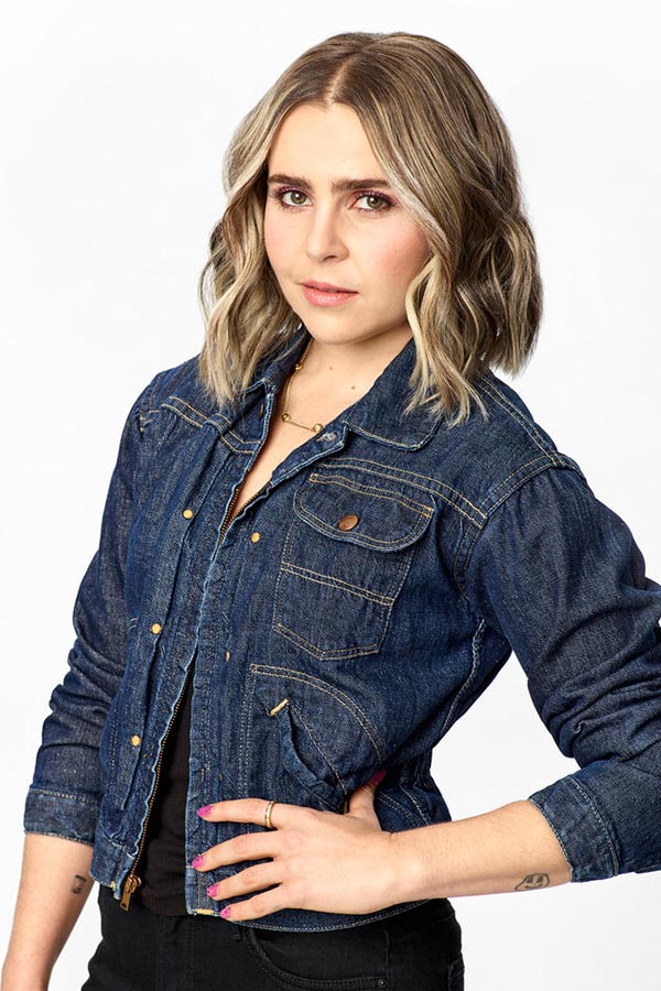 Mae Whitman Small black forearm tattoos and visible wrist-area marks Mae Whitman tattoos: Small black forearm tattoos and visible wrist-area marks