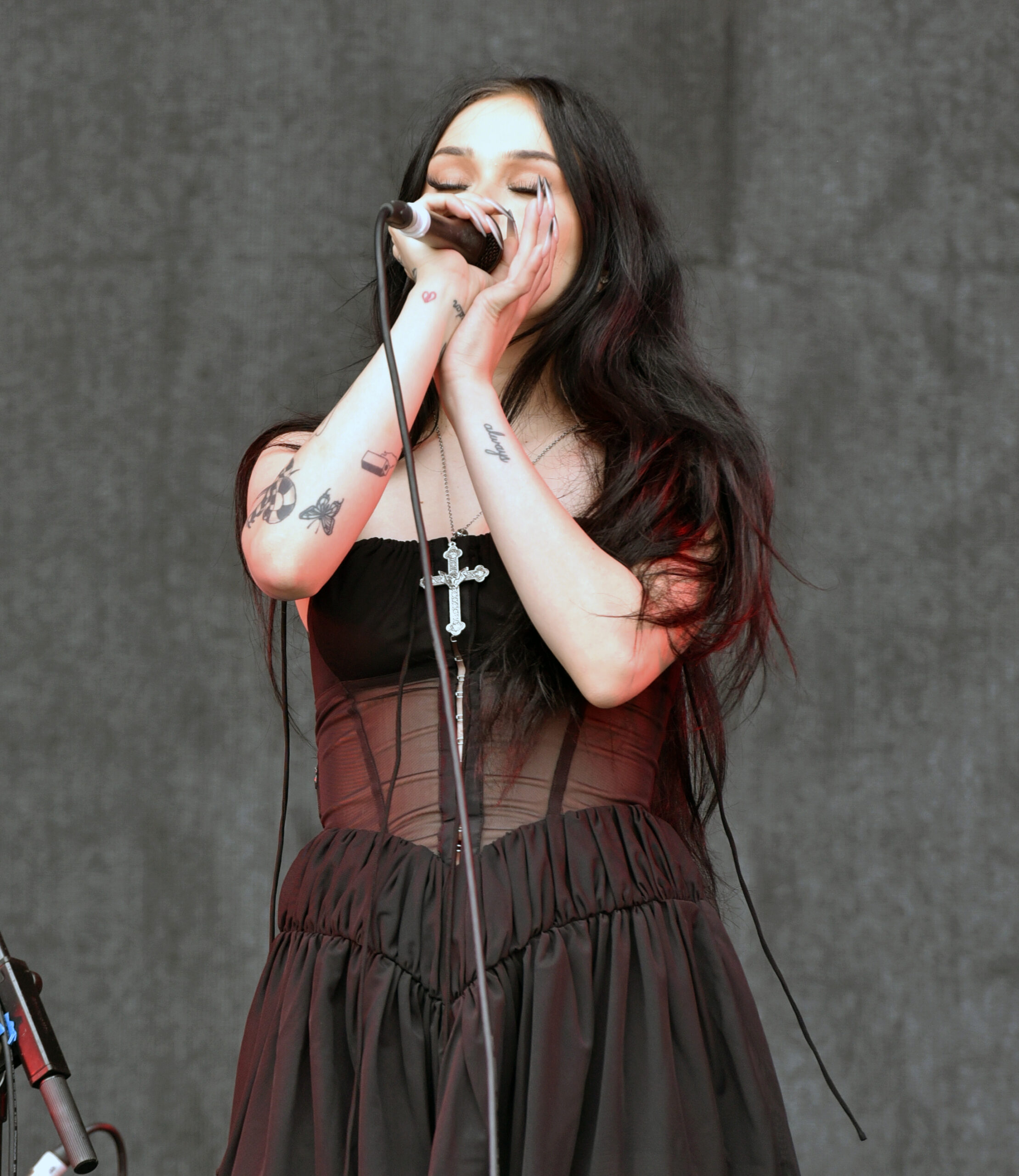 Maggie Lindemann hand and elbow tattoo details