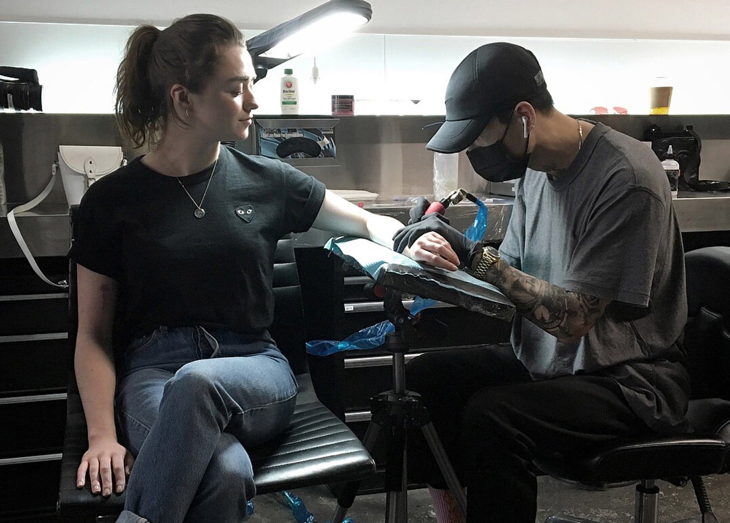 Maisie Williams getting a tattoo on her arm