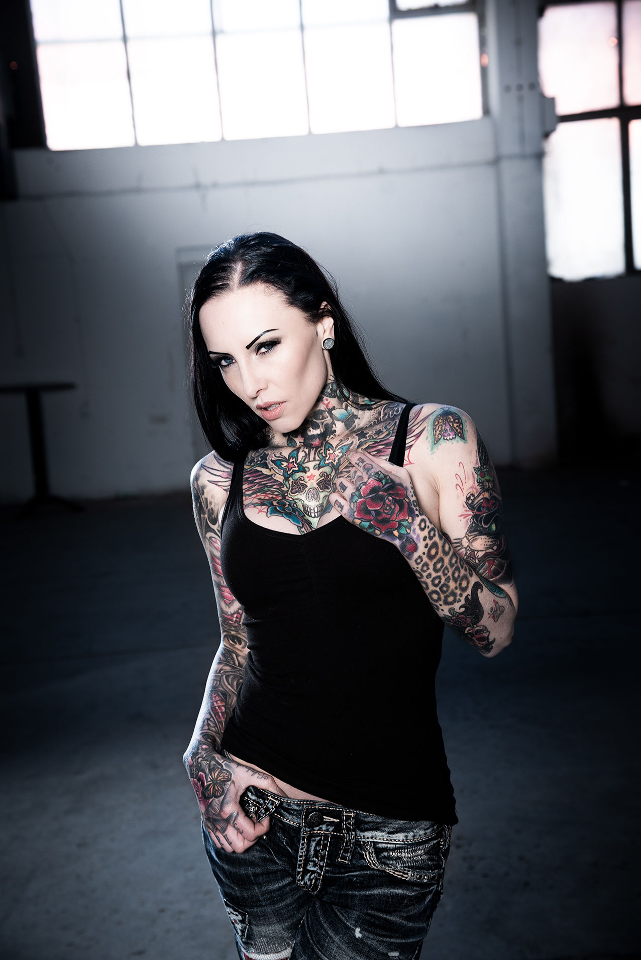 Makani Terror chest and neck tattoos Makani Terror tattoos: colourful chest and neck tattoo coverage