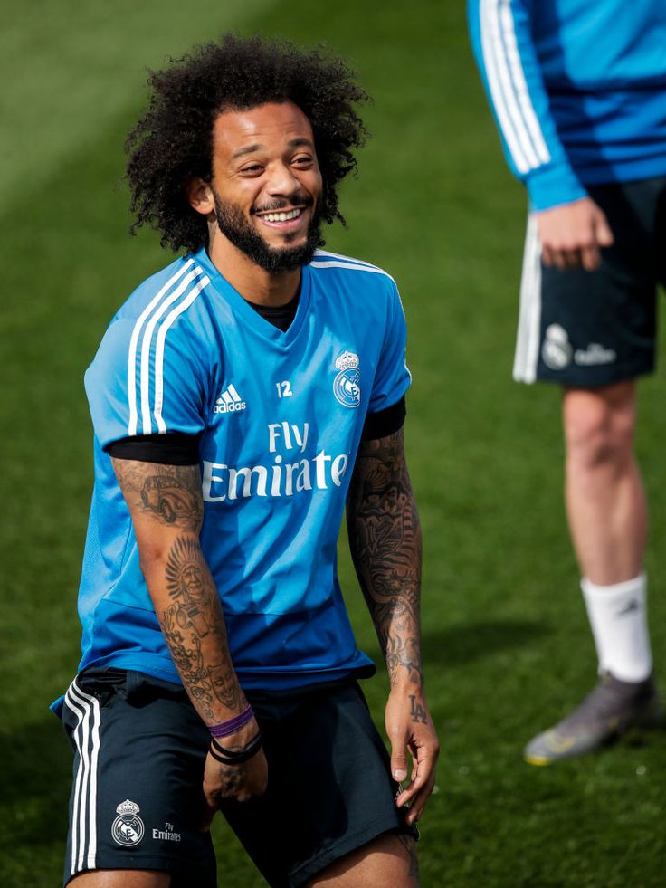 Marcelo tattoos: football symbols and hand ink