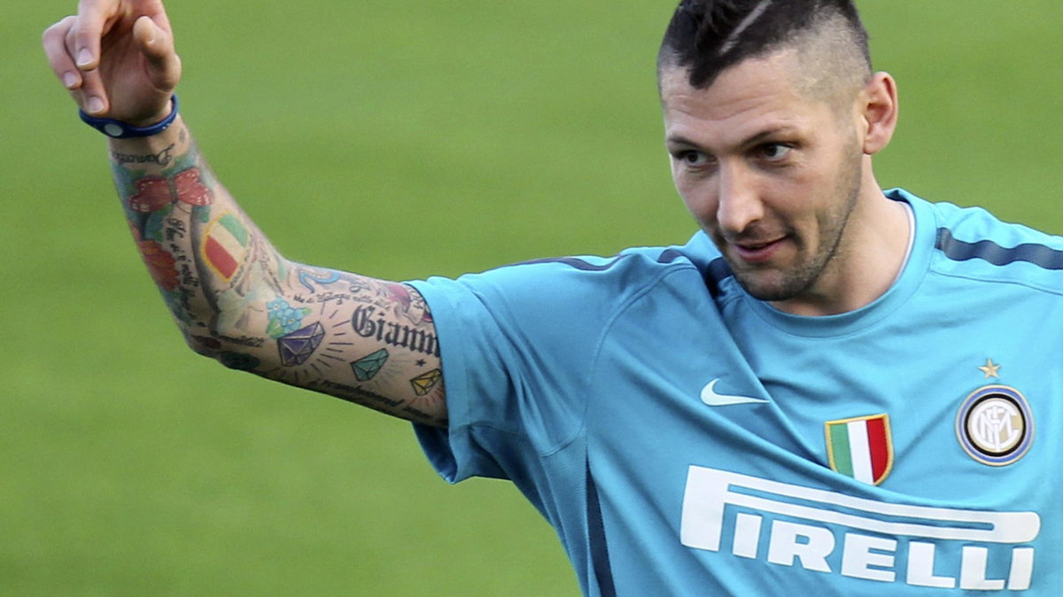 Marco Materazzi tattoos: Side training view showing the sleeve wrapping around the arm