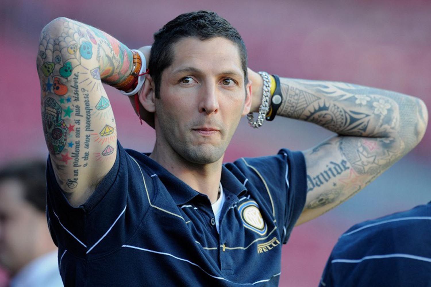 Marco Materazzi tattoos: Single-player view of both tattooed arms and readable script