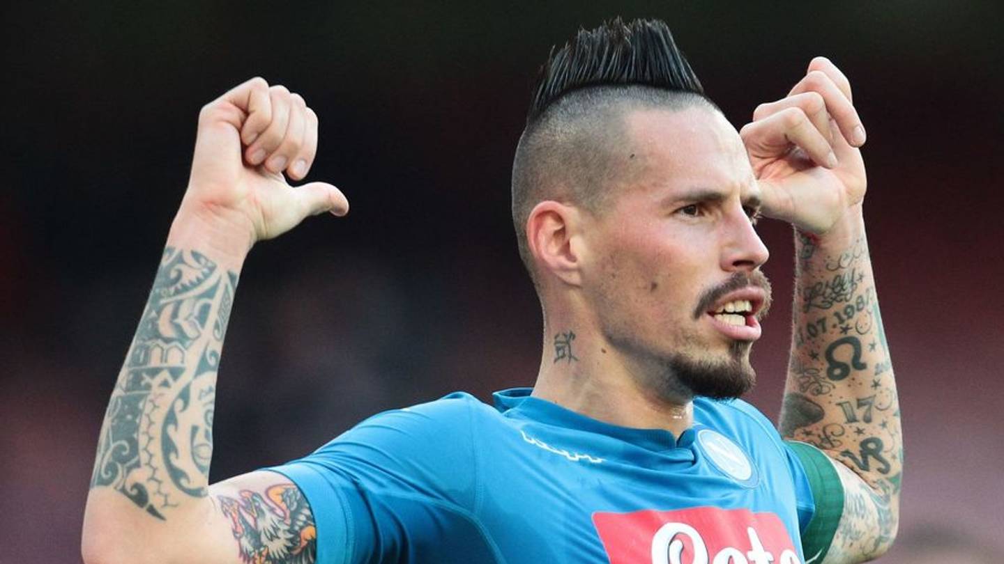 Marek Hamsik Neck and Forearm Tattoos Photo 4 Marek Hamšík tattoos: Hamšík with arms raised; the neck character and tattoos on both forearms are visible