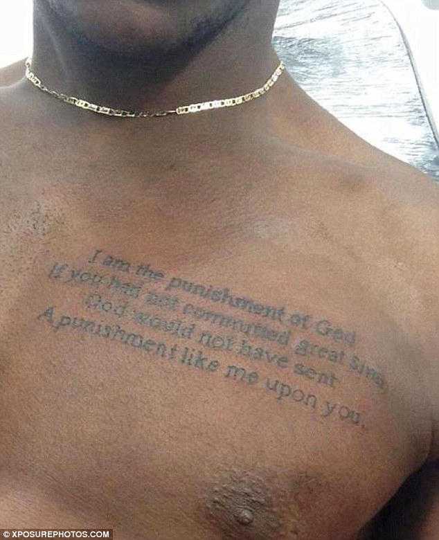 Mario Balotelli chest quote tattoo