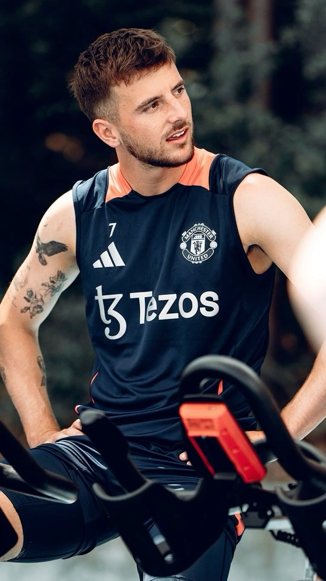 Mason Mount tattoos: Tattoo evidence: separate outdoor training portrait showing the arm collection at a different pose and distance, including the eagle and lower-arm details.