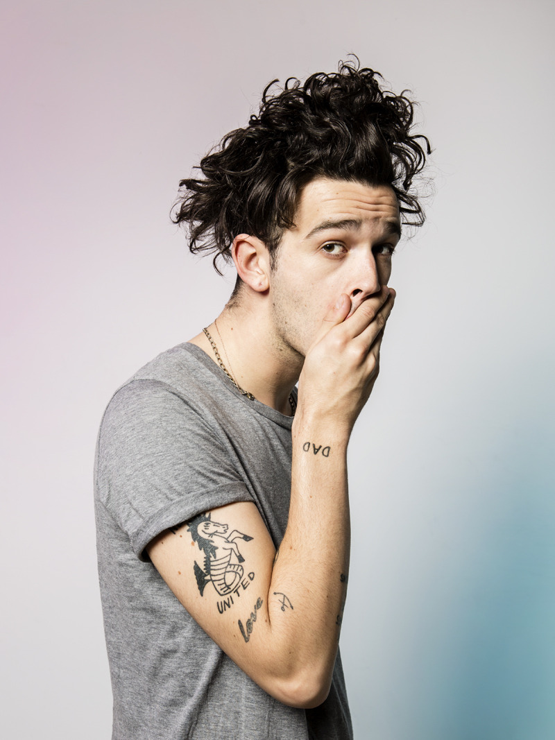 Matty Healy DAD and UNITED arm tattoos