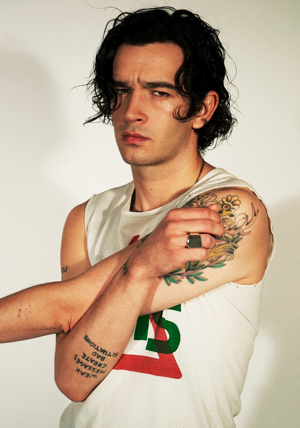 Matty Healy floral sleeve and forearm tattoos