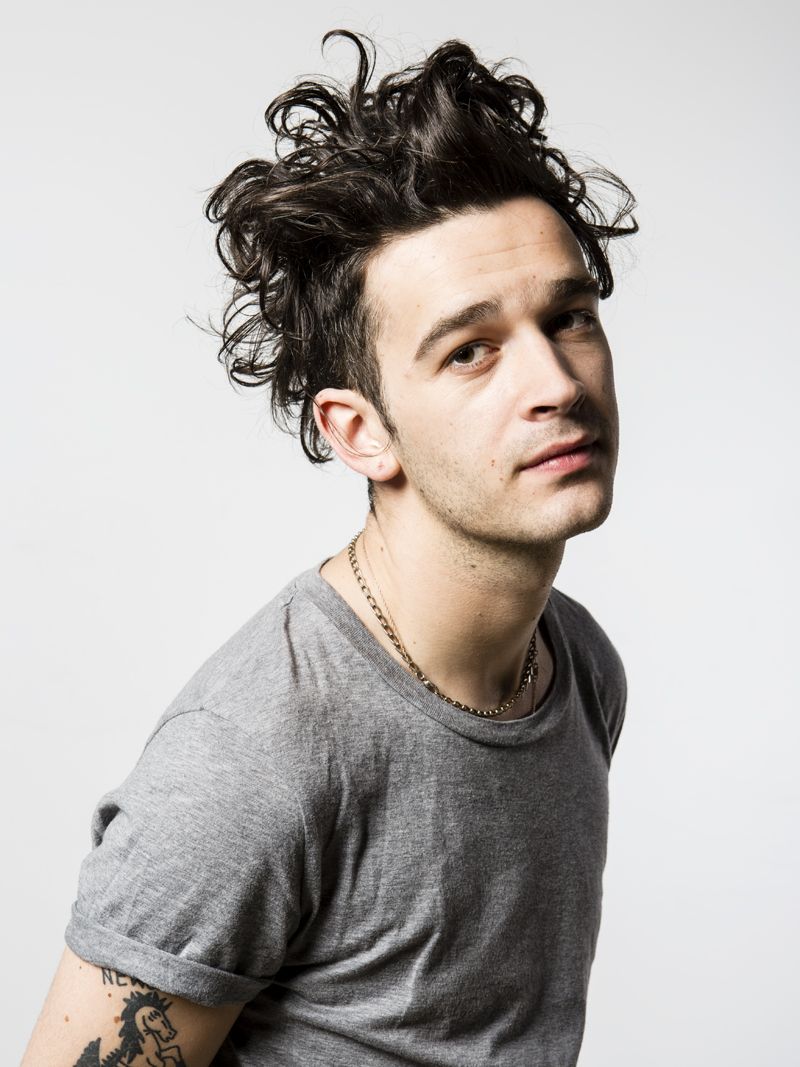 Matty Healy script tattoos on his forearm