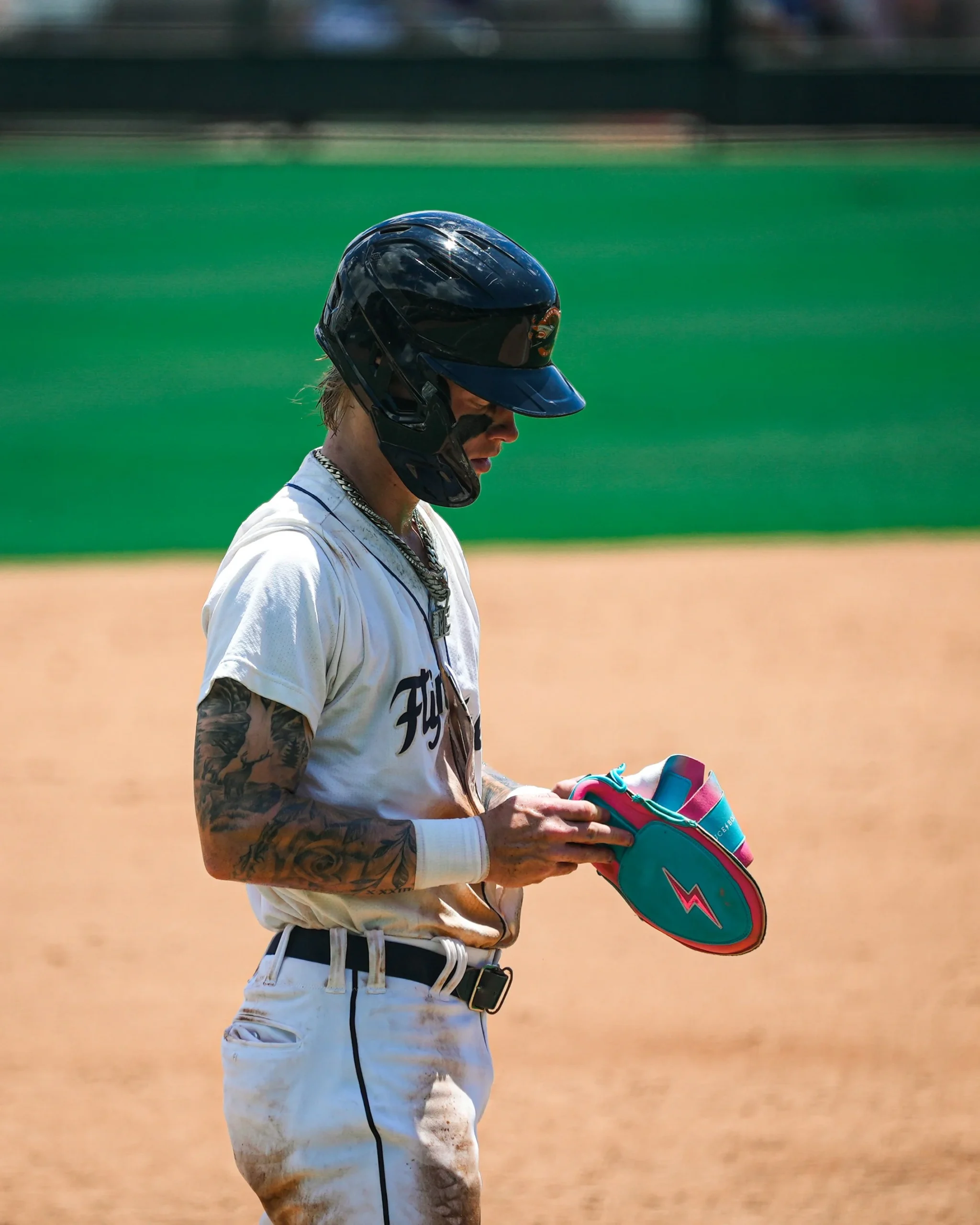 Max Clark tattoos: Max Clark’s arm tattoos in a three-quarter field portrait