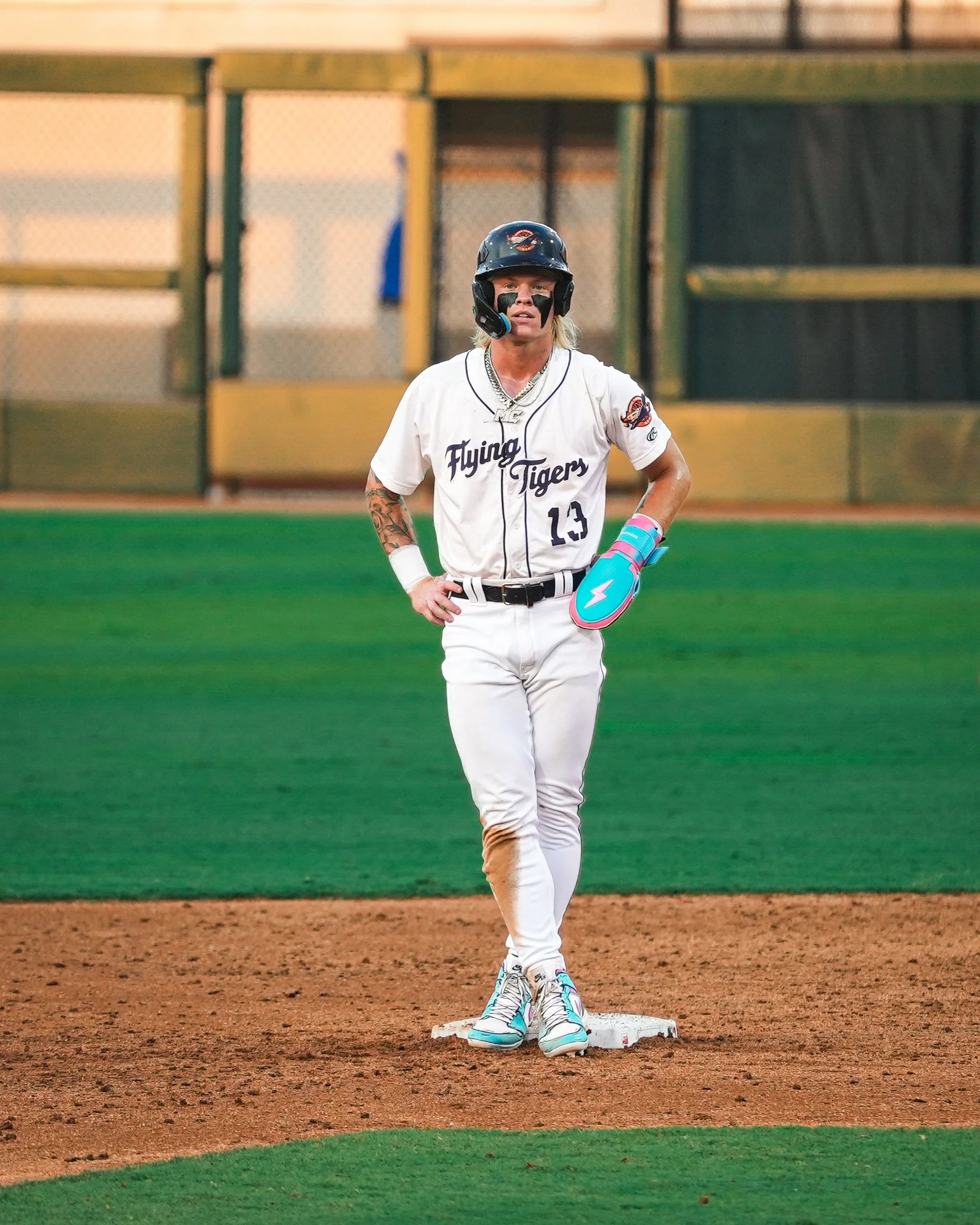 Max Clark tattoos: Max Clark’s arm tattoos while standing on the field