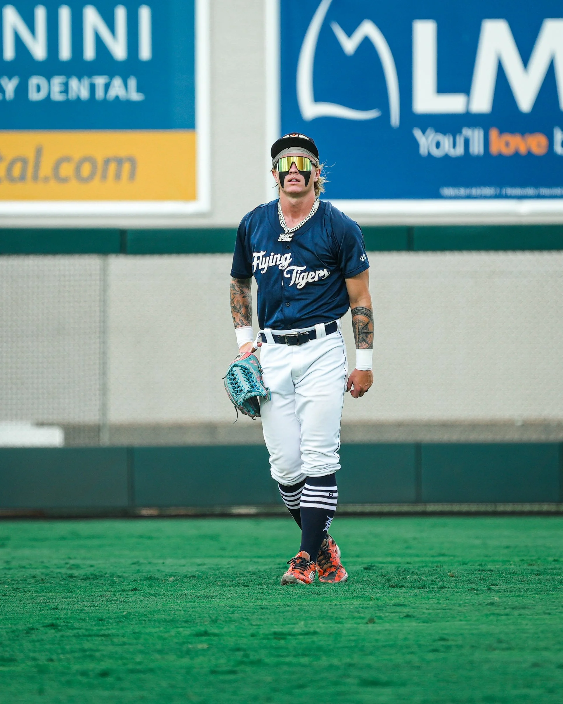 Max Clark tattoos: Max Clark’s full arm coverage in a dark baseball jersey
