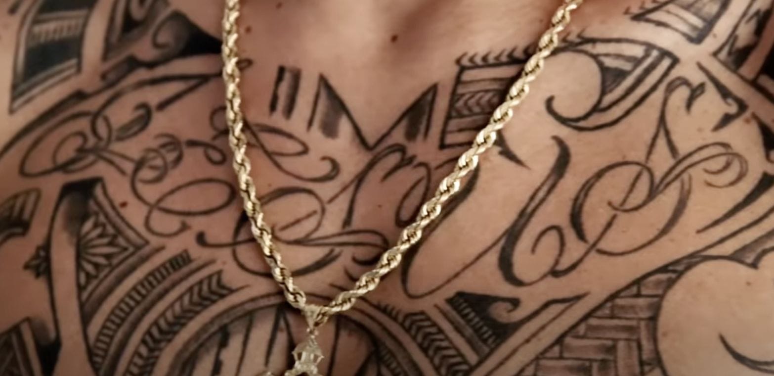 Max Holloway Polynesian Chest Tattoo Detail Max Holloway tattoos: Close view of the Polynesian chest pattern and its internal symbols