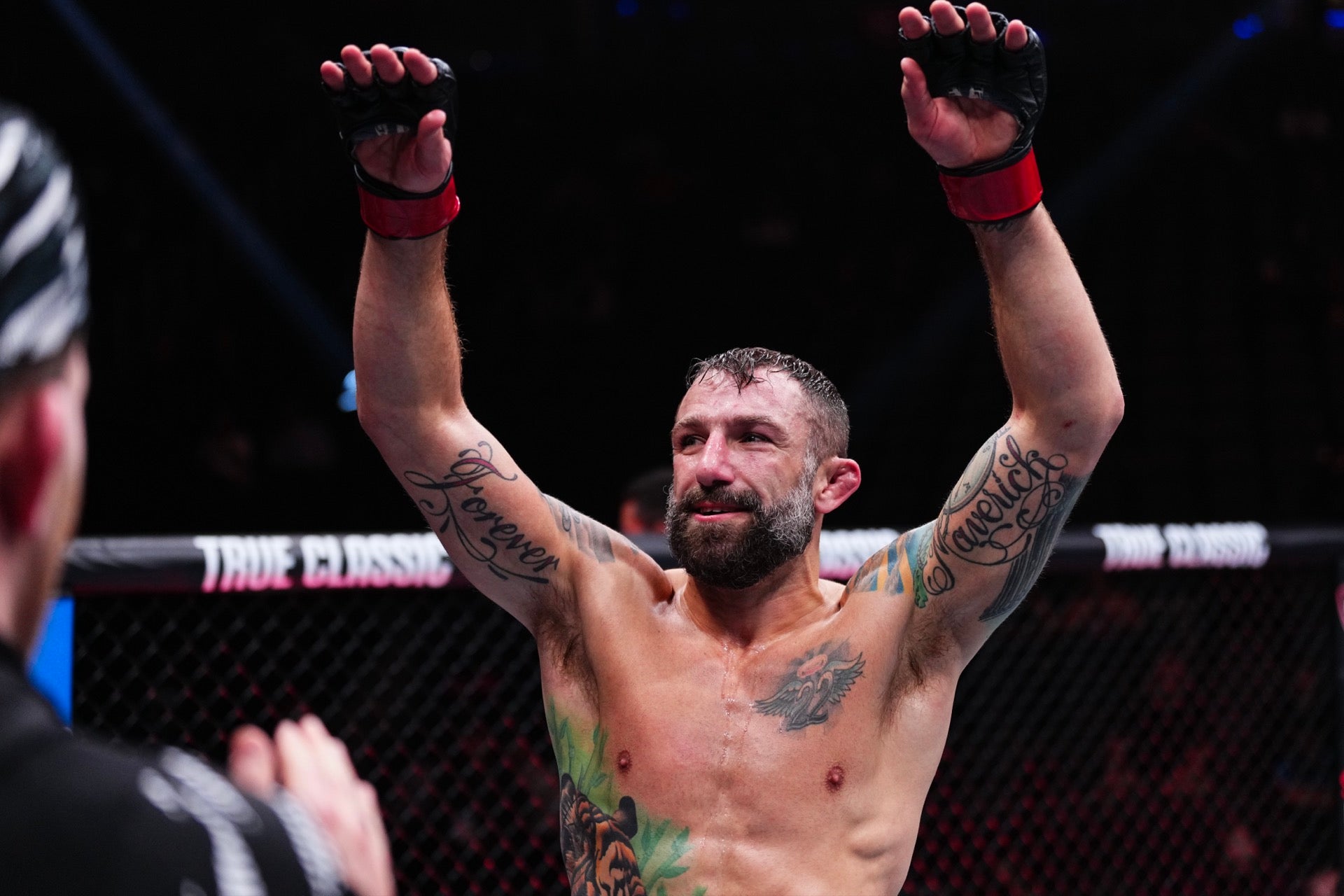 Michael Chiesa tattoos: The Forever Maverick lettering and winged 22 tattoo