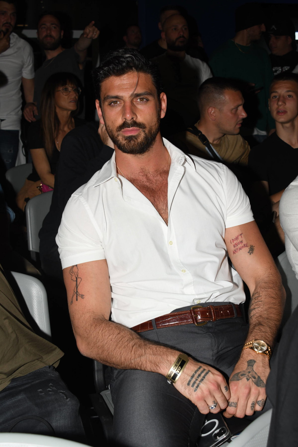 Michele Morrone tattoos: Shows the placement and scale of several arm tattoos in context.