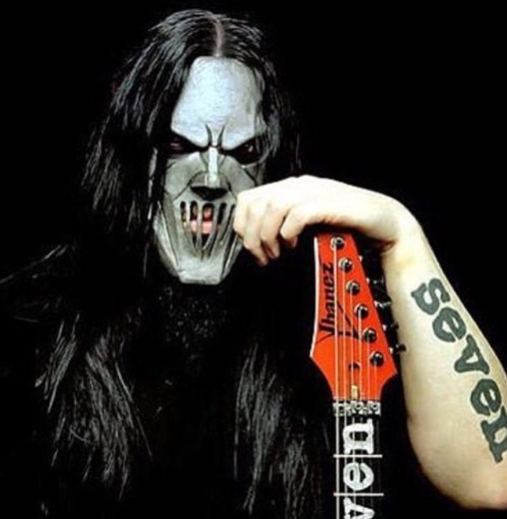 Mick Thomson seven tattoo close-up