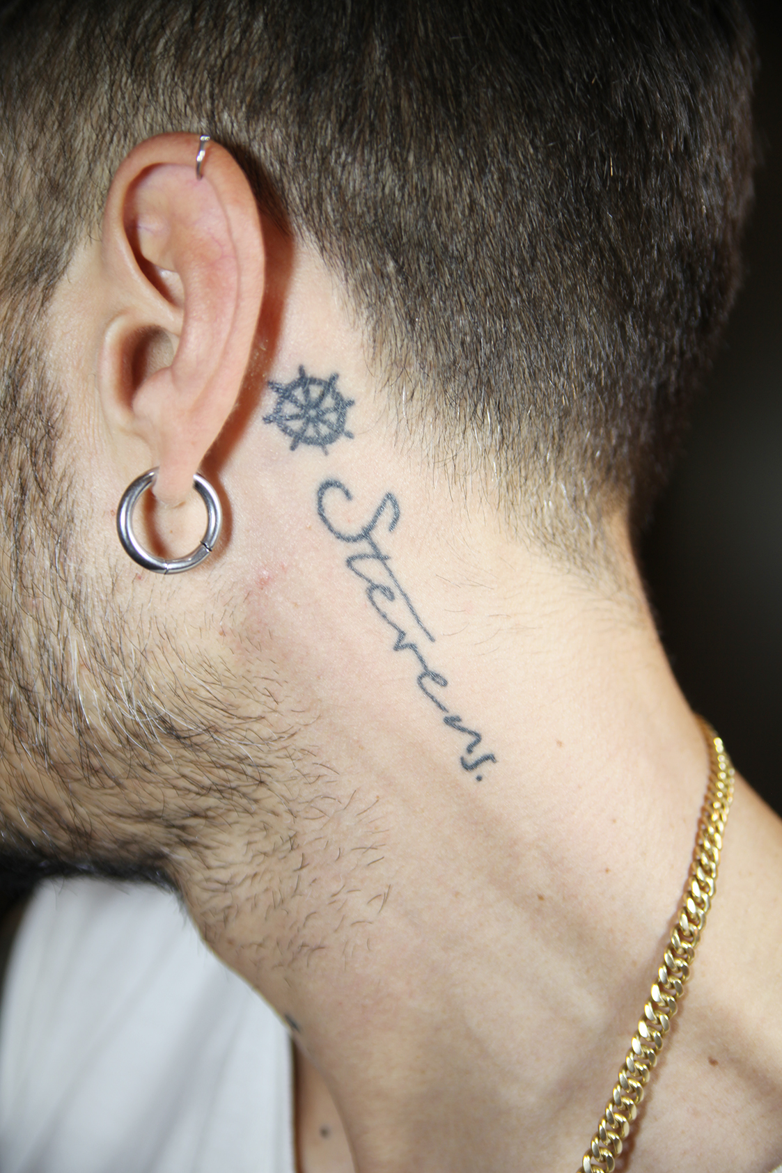 Mike Bahía tattoos: The Stevens memorial tattoos behind his ear