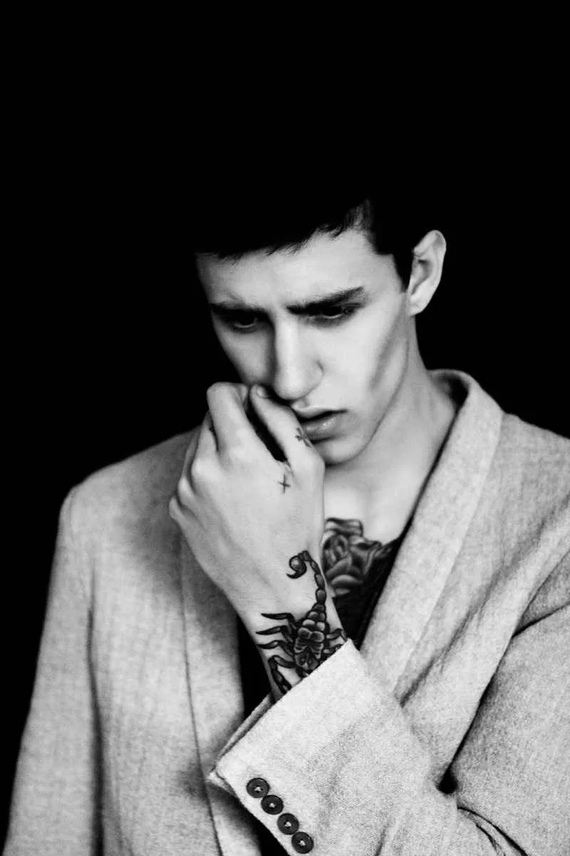 Miles Langford scorpion wrist tattoo