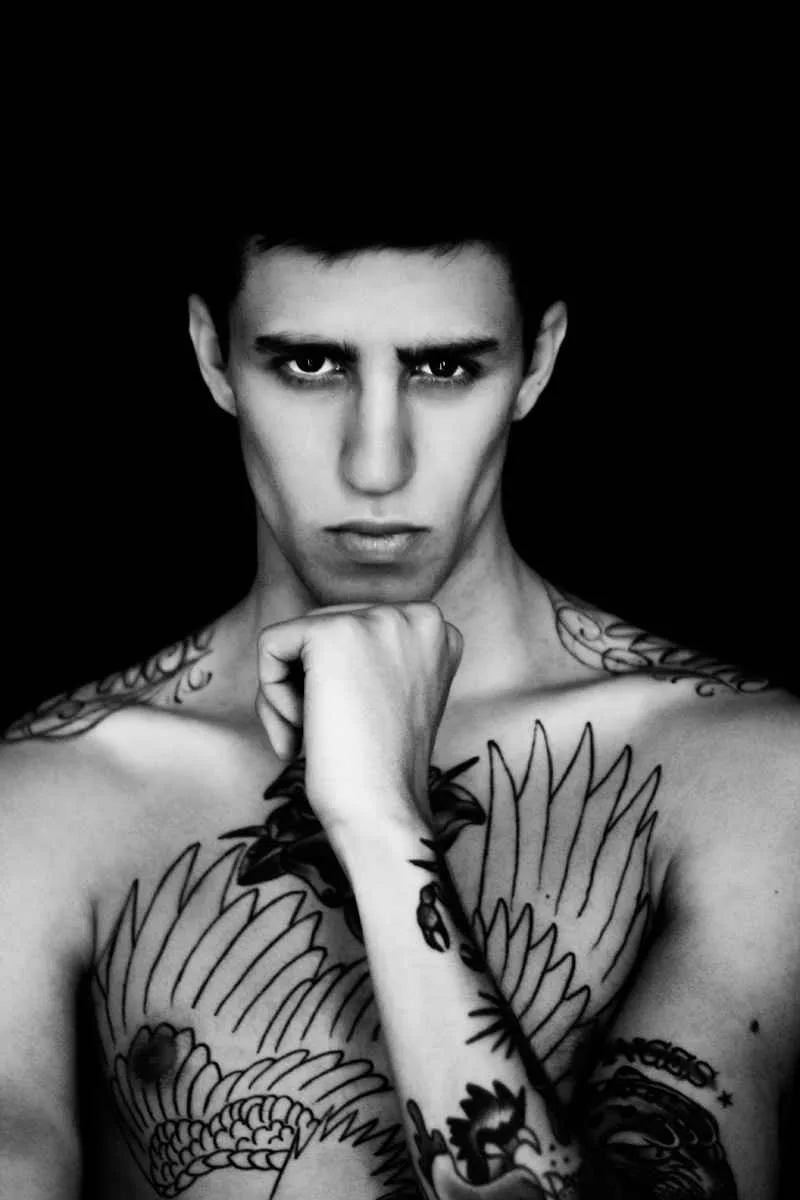 Miles Langford shoulder script tattoos
